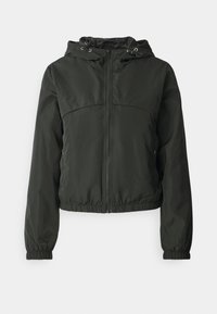 Dunkelgrön kort vindjacka med dragkedja fram, elastiska muddar och en huva med dragsko. Har ett mjukt, lätt material.