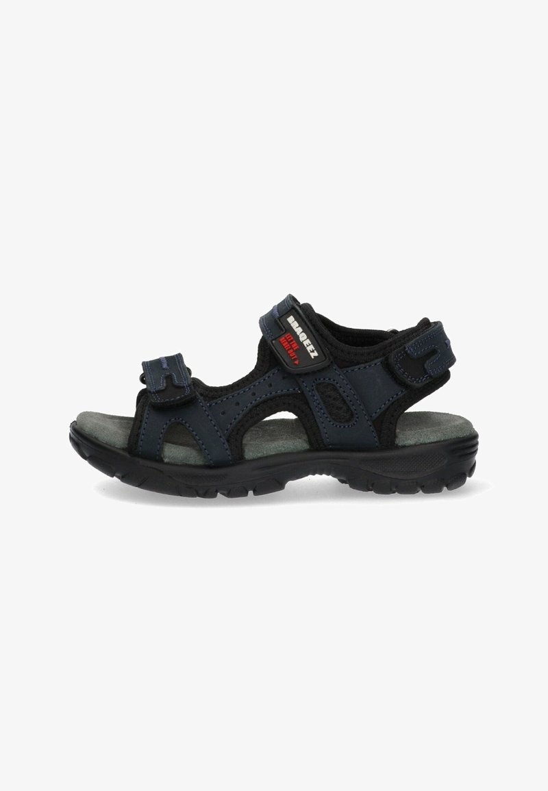 Open-toe sandals featuring a dark navy upper, black accents, dual adjustable Velcro straps, and a textured gray insole. Rubber sole for grip.