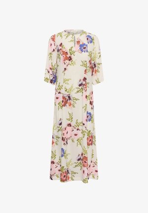 Lillelilles seelik kreemjavahul, millel on säravad roosad, sinised ja burgundi lilled. Libe kangas, kolmeveerandi varrukad ja ümar kaelus.