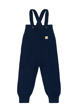 Gestrickte marineblaue Latzhose mit verstellbaren Kreuzträgern und zwei Knöpfen an der Taille. Beinhaltet ein kleines Etikett auf der Vorderseite.