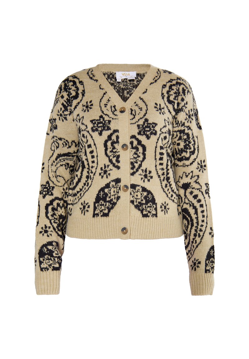 Beige stickad cardigan med ett svart paisleymönster, V-ringning och fem bruna knappar framtill. Ribbad mudd och nederkant. Kort design.