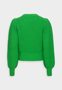 Pull vert en maille avec manches bouffantes, encolure ronde et ourlet côtelé. Le tissu texturé est vibrant avec une couleur audacieuse.
