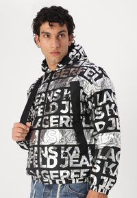 Karl Lagerfeld Jeans LIGHT PADDED JACKET - Giacca da mezza stagione - digital fold