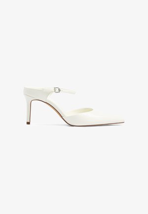 White pointed-toe high heel with ankle strap and buckle, smooth finish, and slim mid-height heel.