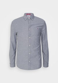 Blue button-up shirt with long sleeves, cotton blend fabric, collar, and a small logo on the left chest. Light texture, regular fit.