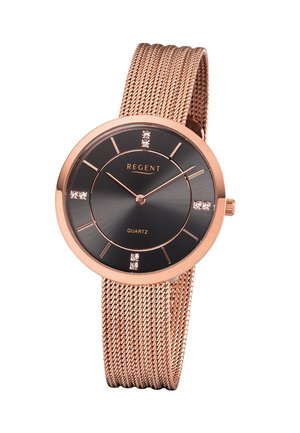 Montre-bracelet à bracelet en maille or rose avec cadran noir, index horaires minimalistes, accents en cristal aux positions 12, 3, 6 et 9 heures, et mouvement à quartz.