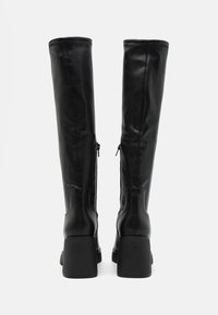 Black leather knee-high boots with a smooth finish, side zip closure, and chunky block heels. Stitch detailing along the seams.