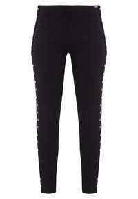 Czarne legginsy z bocznymi guzikami zapinanymi na napy. Wykonane z elastycznego materiału o gładkiej teksturze, zaprojektowane na dopasowaną sylwetkę.