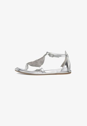 Silver sandal with textured mesh accent, open toe design, ankle strap, and flat sole. Smooth metallic finish and minimal detailing.