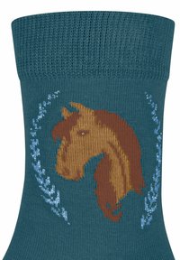 Türkisfarbener Stricksocken mit einem braunen Pferdekopfdesign, umgeben von floralen Akzenten in Hellblau und Weiß. Weiche Textur, mittellange Socken bis zur Wade.