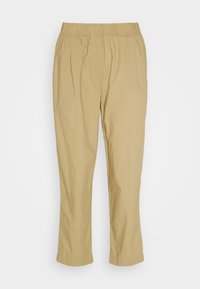 Pantaloni dritti beige a vita elastica con tasche laterali, progettati per l'abbigliamento casual.