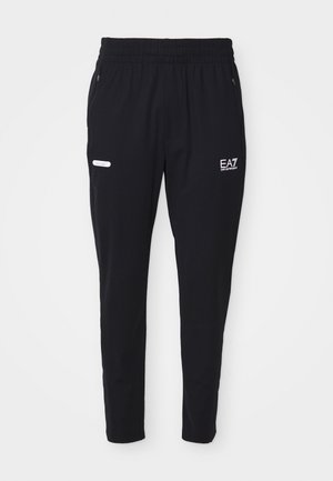 Czarne spodnie dresowe wykonane z miękkiego materiału, z elastycznym pasem, wyposażone w dwie zasuwane boczne kieszenie oraz białe akcenty z logo.