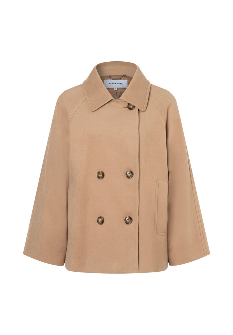 Beige dubbelzijdige jas met een brede kraag, raglanmouwen en twee voorkruiszakken; gemaakt van zachte stof met een gladde textuur, voorzien van goudkleurige knopen.