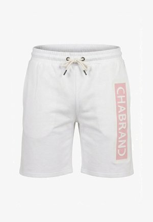 Shorts décontractés blancs avec taille élastique et cordon de serrage, présentant un écusson logo vertical rose portant l'inscription « CHABRAND » sur la jambe droite.