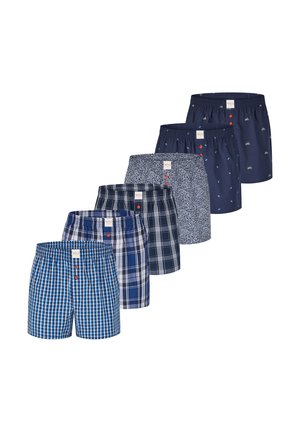 Ensemble de boxers dans diverses tonalités de bleu, comportant des motifs à carreaux, géométriques et des accents imprimés. Ceintures élastiques et fermetures à boutons.
