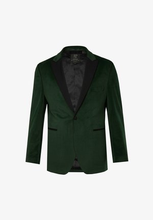Groene fluwelen blazer met zwarte satijnen revers, enkele knoopsluiting en twee voorzakken. Gevoerde binnenkant met subtiele patroondetails.