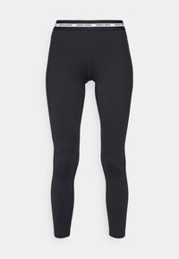 Leggings ajustados negros con textura acanalada y cinturilla elástica blanca que presenta el logotipo repetido de Björn Borg.