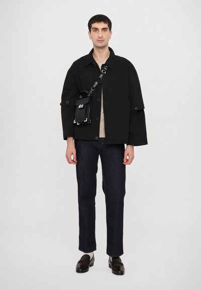 Henrik Vibskov BUTTON JACKET UNISEX - Lehká bunda - black