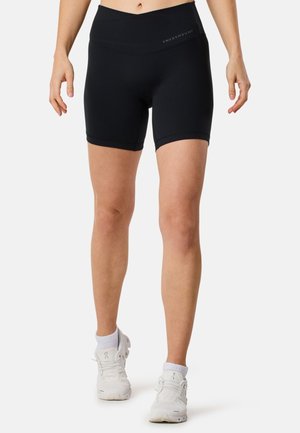 CORE WRAP - Leggings - black