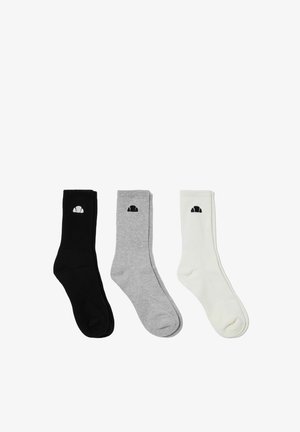 Drei Paare von Crew-Socken in Schwarz, Grau und Weiß, jeweils mit einem kleinen Croissant-Logo nahe dem oberen Rand.