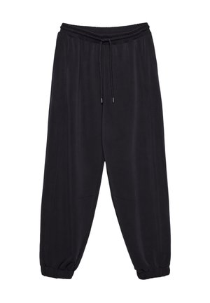 Černé joggingové kalhoty vyrobené z měkké tkaniny, s elastickým pasem a stahovací šňůrkou, zúženými nohavicemi a manžetami na kotnících.