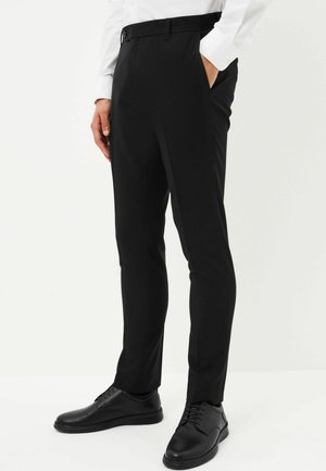 Next SKINNY FIT PLAIN - Stoffhose - black
