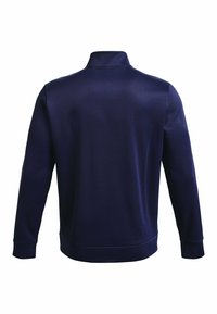 Marineblaues Pullover mit dezentem Glanz, hohem Kragen und langen Ärmeln. Verfügt über eine einfarbige Gestaltung und gerippte Bündchen für einen taillierten Look.