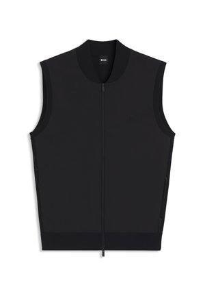 Schwarzige ärmellose Zip-Weste mit geripptem Kragen und Saum, zwei seitlichen Reißverschlusstaschen und dezent eingeprägtem Logo auf der Brust.