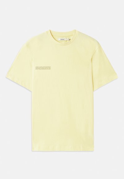Yellow cotton t-shirt with a round neck and short sleeves. Features printed text on the left side. Smooth texture and casual design.