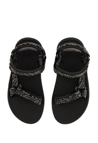 Black sandals with patterned straps and a textured sole. Features adjustable straps for a secure fit. Lightweight design for comfort.