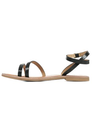 Black sandal with two wide, flat straps and an ankle strap. Smooth leather with a croc pattern. Flat sole, minimalistic design.