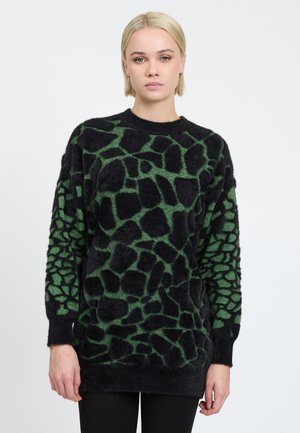 Schwarzer und grüner strukturierter Pullover mit lockerer Passform, ausgestattet mit einem geometrischen Muster und langen Ärmeln, aus einem weichen, flauschigen Material gefertigt.
