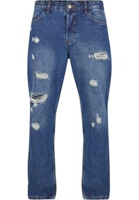 Jeans din denim albastru cu o croială lejeră, având multiple zone deteriorate și detalii dâmburi, design clasic cu cinci buzunare și închidere cu nasture.
