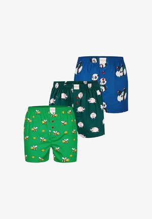Trois paires de boxers : verts avec des abeilles, bleu marine avec des pandas, vert foncé avec des cochons. Tous fabriqués en tissu léger, avec des ceintures élastiques.