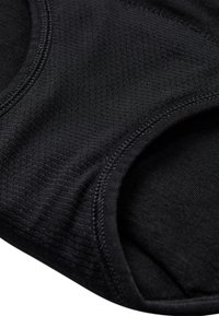 Sort sportsbh med struktureret stof, glat finish og minimal syning rundt om kanterne, designet til komfort og støtte.