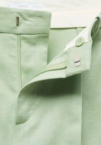 Mango Pantaloni - light green