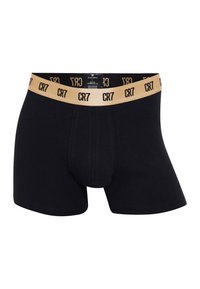 Svarta boxershorts med ett elastiskt midjeband i guld med "CR7"-logotyp. Tillverkade av 95 % bomull och 5 % elastan, vilket ger en mjuk textur.