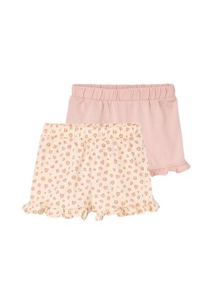 Two pairs of toddler shorts with elastic waistbands; one solid light pink, the other cream with pink heart leopard spots, both with ruffled hems.
