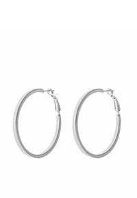 Silverfärgade hängande örhängen med en slät yta, som har en sömlös cirkelform och en fjäderlåsning. Diametern är medelstor.