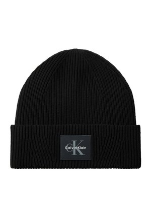 Bonnet en maille côtelée noire avec revers, orné d'un patch noir avec lettres et texte gris du logo Calvin Klein.