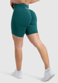 Smilodox MARIA SOLID SHORTS SCRUNCH KURZE HOSE SEAMLESS - Tights - dunkel grün