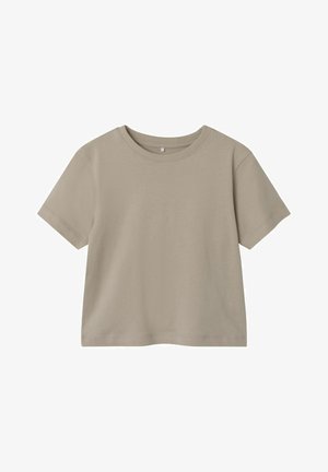 T-shirt di cotone beige con maniche corte, scollatura rotonda, orlo dritto e una texture liscia. Design semplice e monocolore.