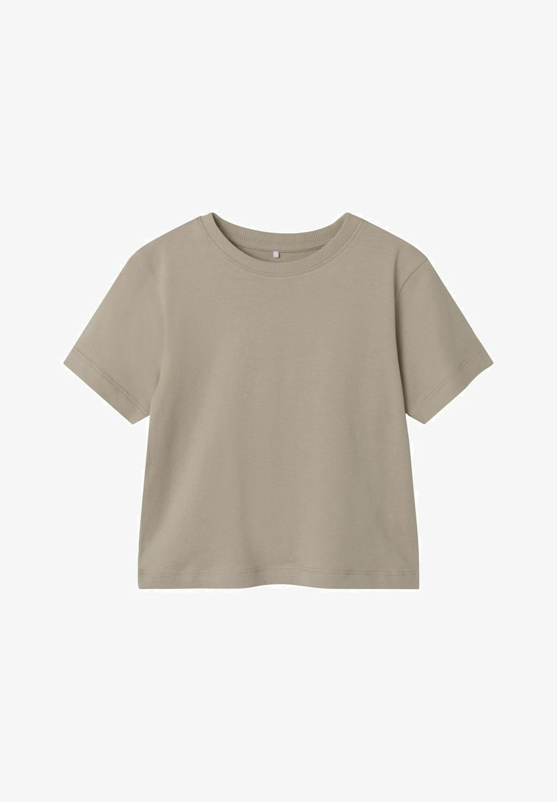 T-shirt di cotone beige con maniche corte, scollatura rotonda, orlo dritto e una texture liscia. Design semplice e monocolore.