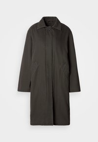 Long black coat with collar, hidden button closure, and slanted side pockets, displayed on a plain light background.