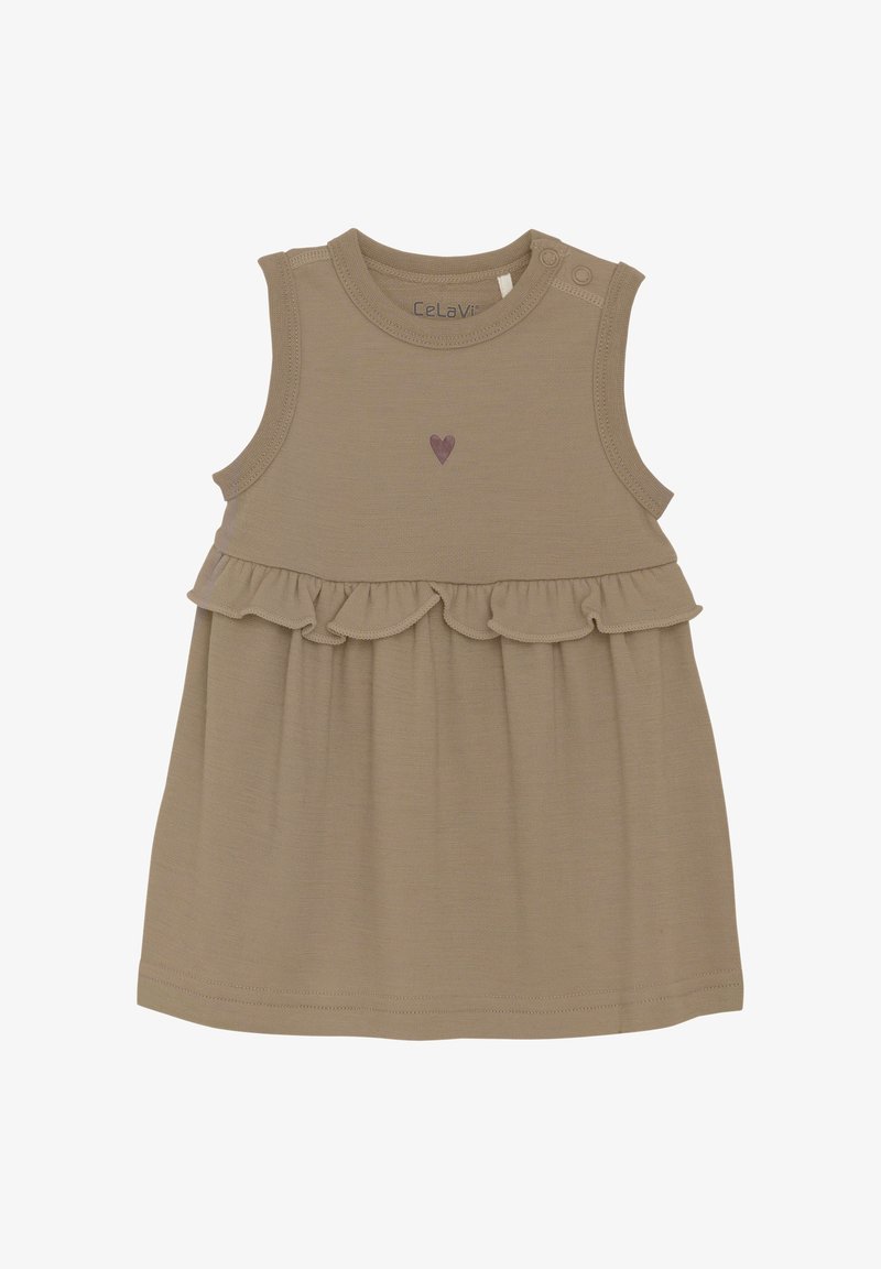 Tan ärmlös klänning med volangkant, prydd med ett litet lila hjärtaccent på bröstet och tryckknappar på axeln för enkelt påklädande.