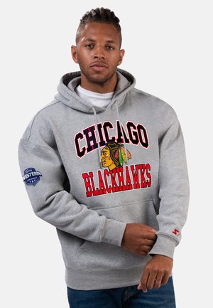 Gray hoodie featuring "Chicago Blackhawks" text in red and black. Includes logo with Native American design and NHL Western Conference patch.