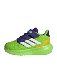 Green athletic shoe with white stripes, purple accents, and an orange detail. Features a textured upper and flexible sole for support.