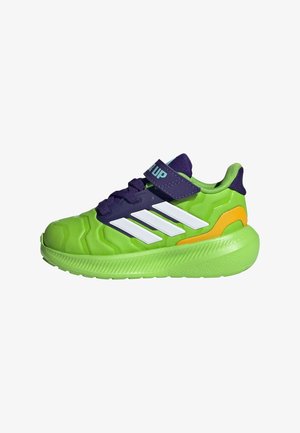 Green athletic shoe with white stripes, purple accents, and an orange detail. Features a textured upper and flexible sole for support.