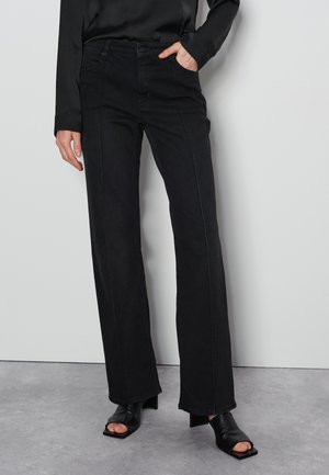 CARIE LINE - Flared Jeans - dusty black