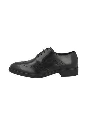Chaussure de ville pour homme en cuir noir avec détails brogue, fermeture à lacets et petit talon empilé, vue de profil sur fond blanc.